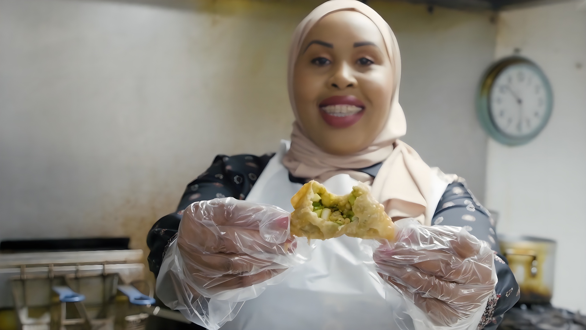 Somali food helps start the conversation. Sharing a meal makes connection easier.