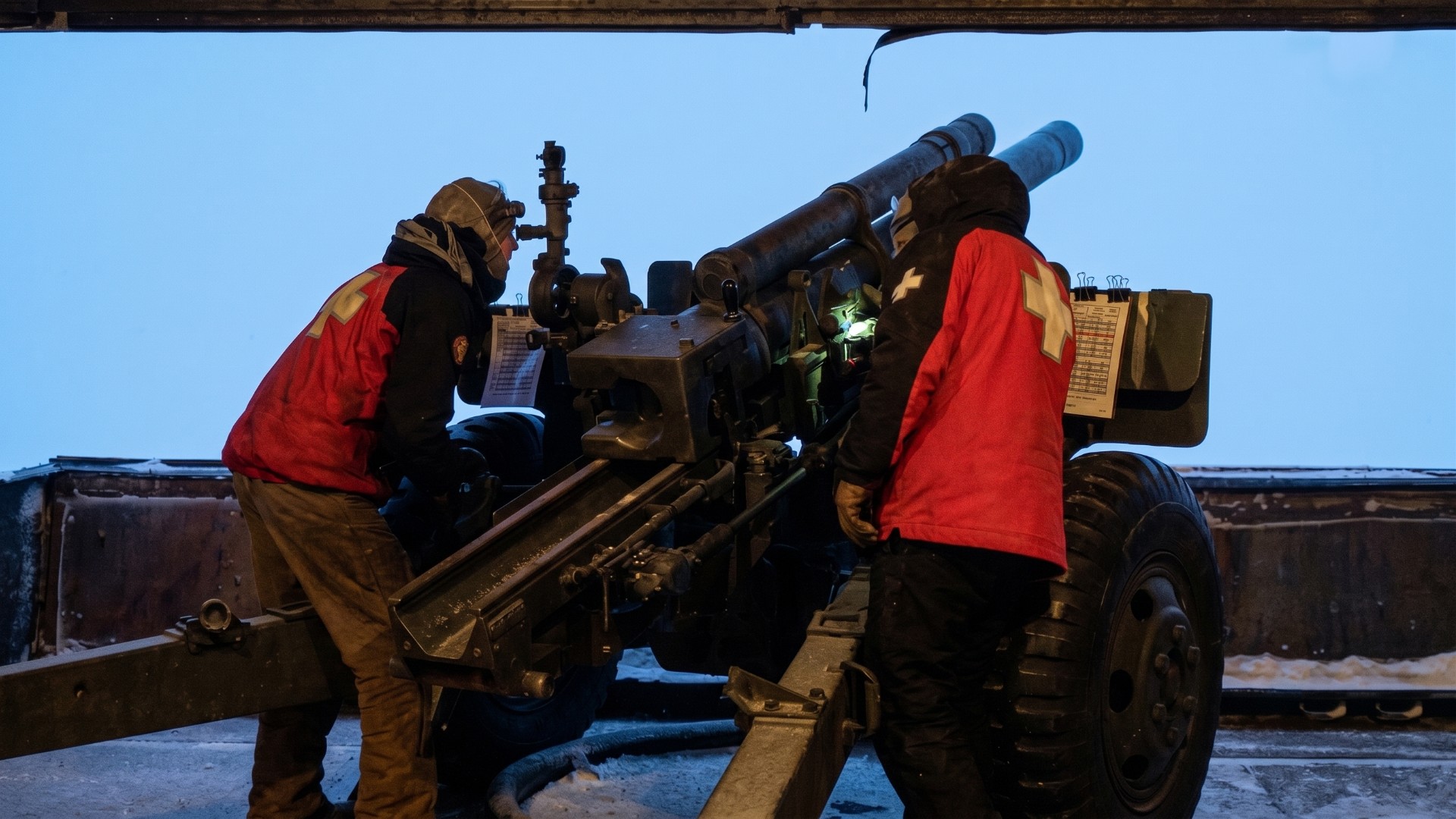 Before sunrise at Mammoth Mountain, ski patrollers head into the storm.