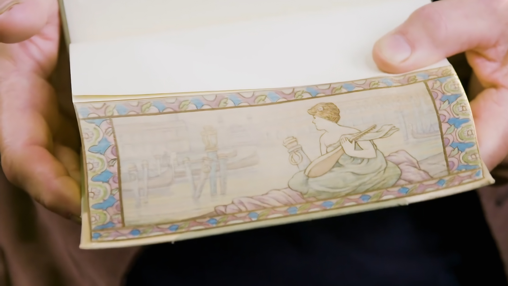 Martin Frost practices a rare artistic tradition. His canvas is the edge of a book.