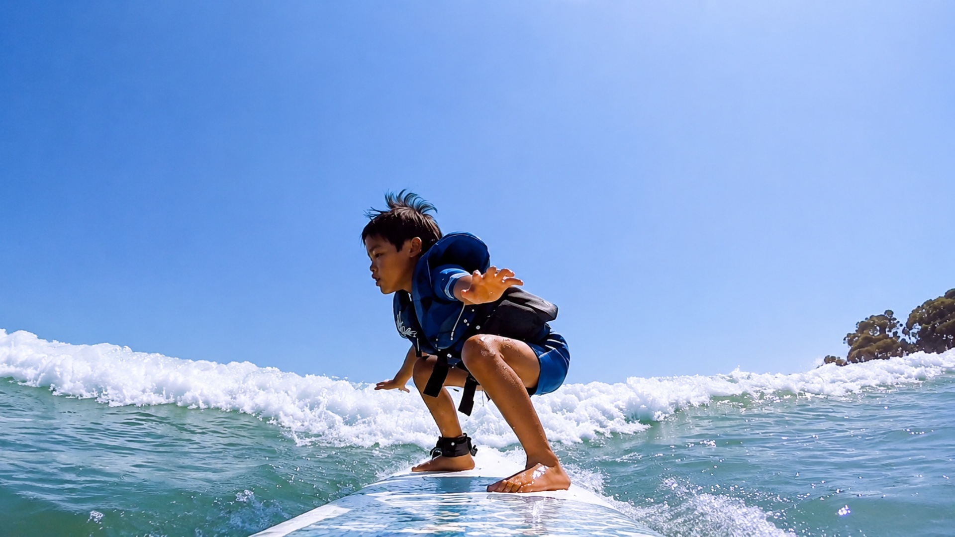 Watching someone catch their first wave is transformative.
